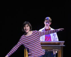 Small Alison (Lila Gold) wants to play airplane in a memory from Alison’s (Moira Stone) childhood in “Fun Home,” presented by TheatreWorks Silicon Valley October 1-28 at the Mountain View Center for the Performing Arts.
NOTE: Lila appears in performances on October 3, 5, 6, 7 (7pm), 9, 11, 12, 13 (8pm), 14 (2pm), 17, 19, 20 (8pm), 21 (2pm), 24 (7:30pm), 25 (2pm), 26, 27.
