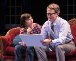 Small Alison (Lila Gold) receives advice on how to improve her school project from father Bruce (James Lloyd Reynolds) in “Fun Home,” presented by TheatreWorks Silicon Valley October 1-28 at the Mountain View Center for the Performing Arts.
NOTE: Lila appears in performances on October 3, 5, 6, 7 (7pm), 9, 11, 12, 13 (8pm), 14 (2pm), 17, 19, 20 (8pm), 21 (2pm), 24 (7:30pm), 25 (2pm), 26, 27.