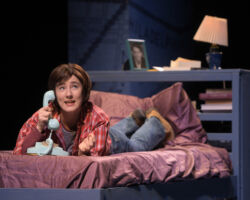 Medium Alison (Erin Kommor) calls home from college in “Fun Home,” presented by TheatreWorks Silicon Valley October 1-28 at the Mountain View Center for the Performing Arts.