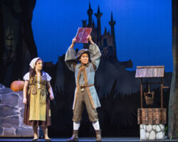 Ella (Christina Lea) looks at Jean-Michel’s (Jomar Martinez) book about the world in “Rodgers + Hammerstein’s Cinderella,” presented by Foothill Music Theatre July 18 – August 4, 2019.