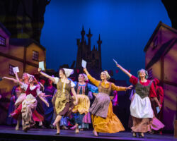 Townspeople hold up invitations to the Prince’s ball in “Rodgers + Hammerstein’s Cinderella,” presented by Foothill Music Theatre July 18 – August 4, 2019.
