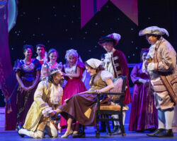 (Center foreground): Prince Topher (Edward Lea) tries the lost slipper on Ella (Christina Lea) in “Rodgers + Hammerstein’s Cinderella,” presented by Foothill Music Theatre July 18 – August 4, 2019.
