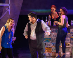 Pictured (L-R): Anne-Marie MacIntosh as Diana, Rafael Porto as Putnam, Brennan Blankenship as Brittomara, a shape-shifting devil appearing as a bartender, and Elisa Sunshine as Selena in the world premiere of "If I Were You" by Jake Heggie and Gene Scheer, presented by Merola Opera Program, August 1-6 at the Herbst Theatre in San Francisco.