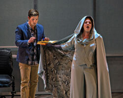 Pictured: Fabian (Michael Day) is an aspiring writer who becomes ensnared by Brittomara (Cara Collins), a shape-shifting devil in the world premiere of "If I Were You" by Jake Heggie and Gene Scheer, presented by the Merola Opera Program, August 1-6 at the Herbst Theatre in San Francisco.