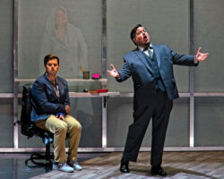 Pictured: Michael Day (left) as Fabian, an aspiring writer who yearns for adventure, and Rafael Porto (right) as Putnam, his unpleasant boss. Behind is Cara Collins as Brittomara, a shape-shifting devil in the world premiere of "If I Were You" by Jake Heggie and Gene Scheer, presented by Merola Opera Program, August 1-6 at the Herbst Theatre in San Francisco