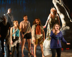 Esther Tonea (far right) as Diana is surrounded by lost souls in the world premiere of "If I Were You" by Jake Heggie and Gene Scheer, presented by Merola Opera Program, August 1-6 at the Herbst Theatre in San Francisco.