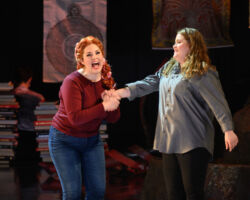 Pictured (L-R): Cara Collins as Brittomara, a shape-shifting devil appearing here as a hairdresser, and Esther Tonea as Diana in the world premiere of "If I Were You" by Jake Heggie and Gene Scheer, presented by Merola Opera Program, August 1-6 at the Herbst Theatre in San Francisco