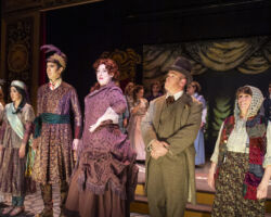 Suspects for Drood's killer (l to r: Aaron Hurley, Brenna Sammon, Rachelle Abbey, David Murphy, Heather Orth, Benjamin Ball, Linda Piccone, and Dan Cardenas) line up in "The Mystery of Edwin Drood," presented by Foothill Music Theatre February 27 - March 8 at the Lohman Theatre in Los Altos Hills.