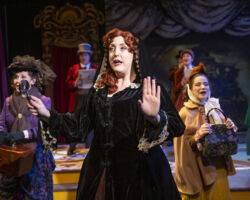 Princess Puffer (foreground: Heather Orth) and the citizens of Cloisterham seek Edwin Drood in "The Mystery of Edwin Drood," presented by Foothill Music Theatre February 27 - March 8 at the Lohman Theatre in Los Altos Hills.