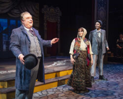 The Chairman (John Mannion) chats with Mrs. Durdles (Linda Piccone) and The Deputy (Dan Cardenas) in "The Mystery of Edwin Drood," presented by Foothill Music Theatre February 27 - March 8 at the Lohman Theatre in Los Altos Hills.