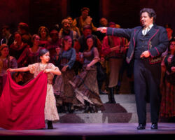 Bullfighter Escamillo (Eugene Brancoveanu) is taken on by a young challenger (Amalinaltzin De La Cruz) from the lauded CANTA (California Academy of Novel and Traditional Arts) children’s chorus in Opera San José's flamenco-infused "Carmen" at the California Theatre, Feb. 12-27, 2022.