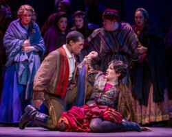 L-R: Micaëla (Anne-Marie MacIntosh) watches in anguish as Don José (Noah Stewart) threatens Carmen (Nikola Printz) in Opera San José's "Carmen" at the California Theatre, Feb. 12-27, 2022.