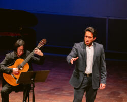 Mario To, guitar, and tenor Angelo Silva performing "Enquanto a noite durar" by Clarice Assad in Merola Opera Program's "The Song as Drama."