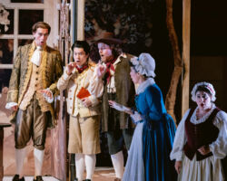 (L to R) Raimbaud (Benjamin Dickerson) creates intrigue among members of a noble household (Jin Yu, Christopher Oglesby, Ariana Maubach, and Alexa Frankian) in Merola Opera Program’s "Le Comte Ory," Jul. 31 and Aug. 2, 2025, at the San Francisco Conservatory of Music’s Caroline H. Hume Concert Hall.