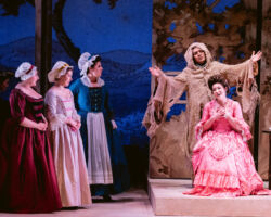(L to R) Alexa Frankian, Ana Maria Vacca, and Ariana Maubach listen as Le Comte Ory (Minghao Liu, top right), disguised as a hermit counsels Comtesse Adèle (Eva Rae Martinez, right) in Merola Opera Program’s "Le Comte Ory," Jul. 31 & Aug. 2, 2025, at the San Francisco Conservatory of Music’s Caroline H. Hume Concert Hall.