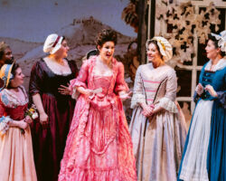 Comtesse Adèle (Eva Rae Martinez, center) shares some news in Merola Opera Program’s "Le Comte Ory," Jul. 31 & Aug. 2, 2025, at the San Francisco Conservatory of Music’s Caroline H. Hume Concert Hall.