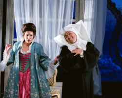 Comtesse Adèle (Eva Rae Martinez) doesn’t realize Le Comte Ory (Minghao Liu) is disguised as a nun in Merola Opera Program’s "Le Comte Ory," Jul. 31 & Aug. 2, 2025, at the San Francisco Conservatory of Music’s Caroline H. Hume Concert Hall.