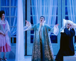 (L to R) Comtesse Adèle (Eva Rae Martinez) watches as Isolier (Meg Brilleslyper) poses as her, to fool Le Comte Ory (Minghao Liu), who is disguised as a nun, in Merola Opera Program’s "Le Comte Ory," Jul. 31 & Aug. 2, 2025, at the San Francisco Conservatory of Music’s Caroline H. Hume Concert Hall.