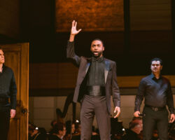 Bass-baritone Justice Yates as Enrico (center), joined by tenor Tristan Tournaud (left) and baritone Joeavian Rivera (right) as the King’s Guards, bursts into the room to accuse Anna of adultery in Donizetti’s "Anna Bolena," featured in Merola Opera Program’s Schwabacher Summer Concert: "It’s Complicated – Love & Opera," July 10 and 12, 2025, at the San Francisco Conservatory of Music’s Caroline H. Hume Concert Hall.