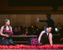 Soprano Ariane Cossette as Leonora (left) confides in her companion, mezzo-soprano Anna Maria Vacca as Ines (right), that although she is being courted by Count di Luna, her heart belongs to another in Verdi’s "Il trovatore," featured in the Merola Opera Program’s Schwabacher Summer Concert: "It’s Complicated – Love & Opera," July 10 and 12, 2025, at the San Francisco Conservatory of Music’s Caroline H. Hume Concert Hall.