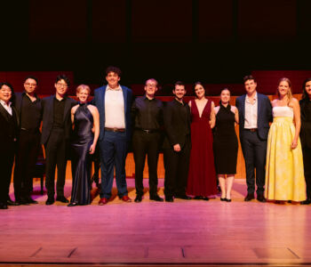 <strong>Merola Opera Program opened its 2026 Summer Festival season with "L'Anima Napoletana" on June 25, 2026 at the San Francisco Conservatory of Music’s Caroline H. Hume Concert Hall.</strong> (Shown L–R: Chester Seungyup Han, Tony Stauffer, Yue Qi Zhang, Shannon Crowley, Theo Harrah, Eric Head, Logan Wagner, Charlotte Kelso, Sakurako Jayne Abe, Cole McIlquam, Stella FitzGerald, and Deven Shah.)
