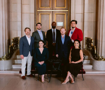 <strong>Merola Opera Program artists will take the stage in Peter Brook's "La Tragédie de Carmen." The performances take place on July 9 & 11, 2026 at the San Francisco Conservatory of Music’s Caroline H. Hume Concert Hall.</strong> (Shown L–R: Top row – Logan Wagner, John Mburu, Raúl Morales Velazco; Middle row – Ryan Bryce Johnson, Charles Styles; Sitting – Anna Thompson, Ariana Maubach.)