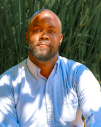 Bass John Mburu stars as Truffaldino in in Merola Opera Program's "Ariadne auf Naxos," performing July 30 & August 1 at the San Francisco Conservatory of Music Caroline H. Hume Concert Hall.