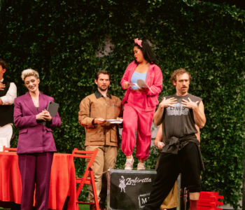 Bass Theo Harrah as The Waiter, Merolini Stage Director Claire Choquette as The Chief of Staff, tenor Logan Wager as Scaramuccio, soprano Emilie Kealani as Zerbinetta, and tenor Ryan Bryce Johnson as The Choreographer in Merola Opera Program's "Ariadne auf Naxos," performing Thursday, July 30 and Saturday, August 1 at the San Francisco Conservatory of Music’s Caroline H. Hume Concert Hall.