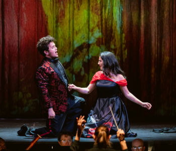 Baritone Raúl Morales Velazco as Escamillo and mezzo-soprano Ariana Maubach as Carmen in Merola Opera Program's "La Tragédie de Carmen," performing July 9 and 11, 2026 at the San Francisco Conservatory of Music’s Caroline H. Hume Concert Hall.