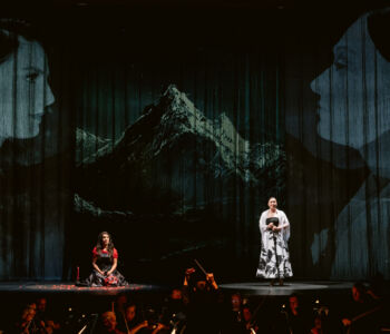 Mezzo-soprano Ariana Maubach as Carmen and soprano Anna Thompson as Micaëla in Merola Opera Program's "La Tragédie de Carmen," performing July 9 and 11, 2026 at the San Francisco Conservatory of Music’s Caroline H. Hume Concert Hall.